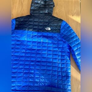 The North Face Blue and Black Puffer Jacket